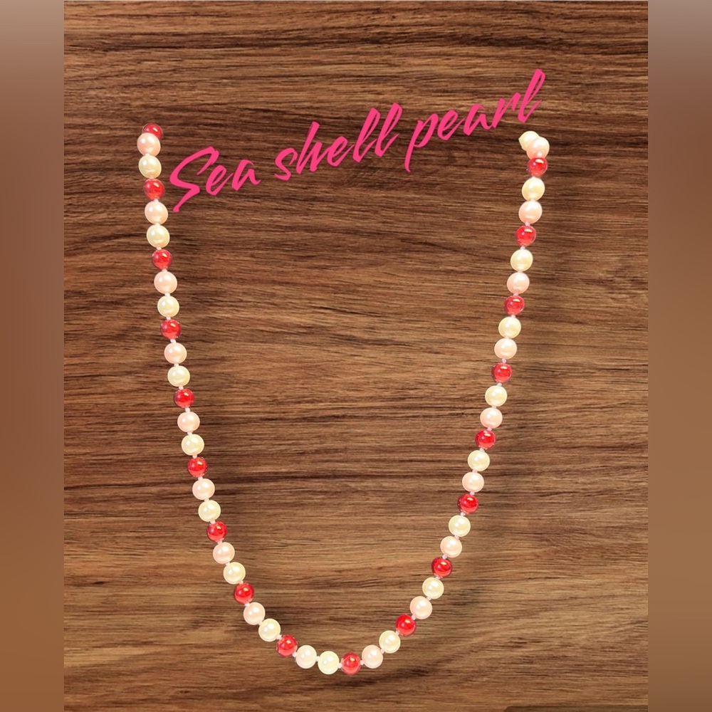 Created sea shell pearl/ mother of pearl strand/knotted NEW